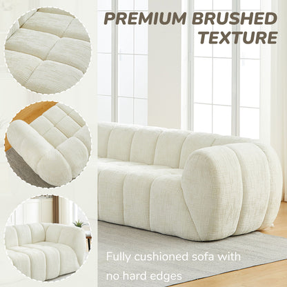 Quilted Cloud Sofa With Rounded Armrests And Piano Key Backrest Design