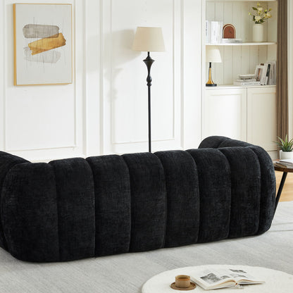 Quilted Cloud Sofa With Rounded Armrests And Piano Key Backrest Design