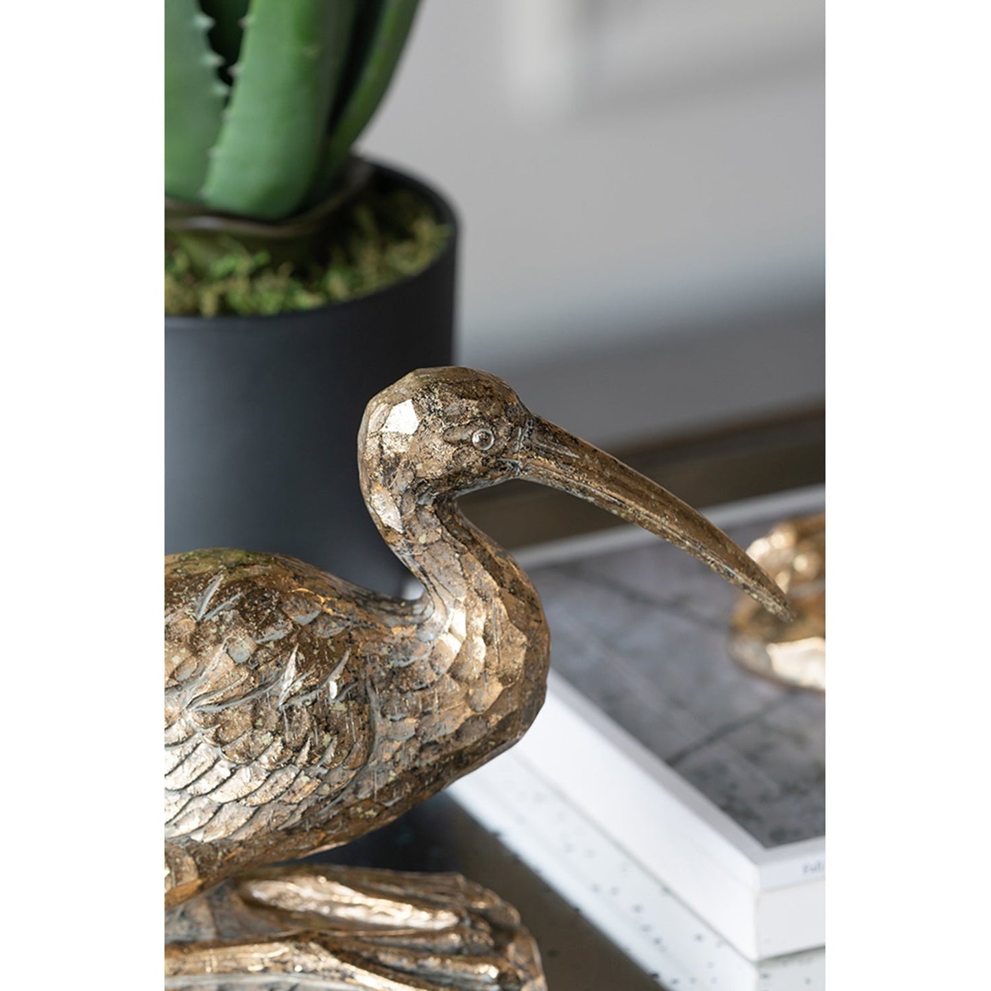 7.1x10.4x3" Kneeling Crane Figurine