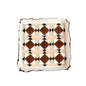 The dog sniffs the mat
