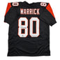 Autographed/Signed Peter Warrick Cincinnati Black Football Jersey Beckett BAS COA