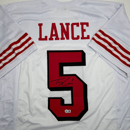 Autographed/Signed Trey Lance San Francisco White Alternate Football Jersey Beckett BAS COA