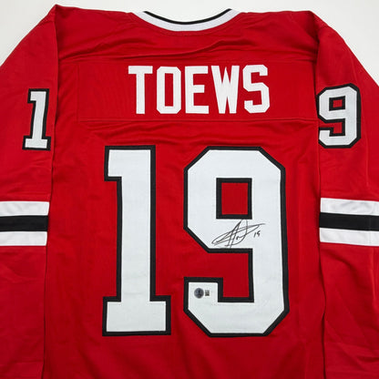 Autographed/Signed Jonathan Toews Chicago Red Hockey Jersey Beckett BAS COA