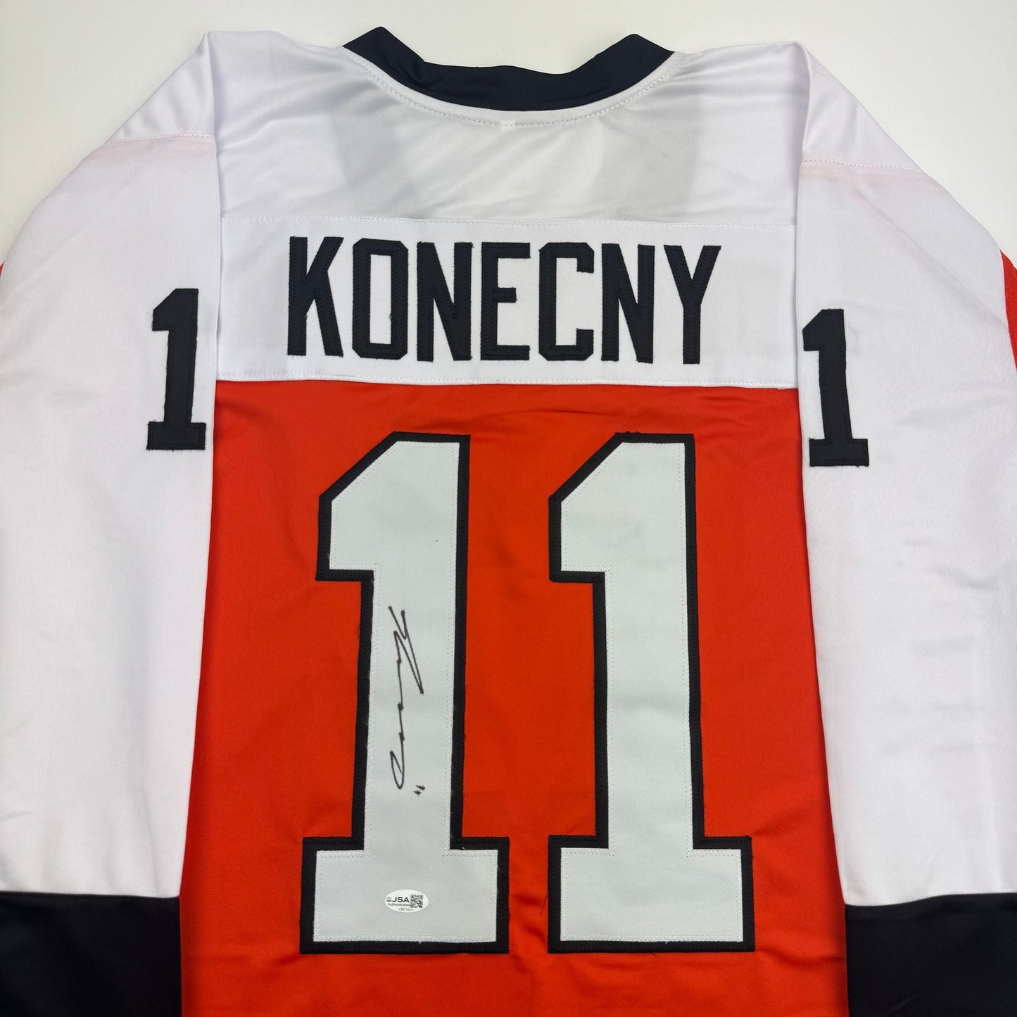 Autographed/Signed Travis Konecny Philadelphia Orange Hockey Jersey JSA COA