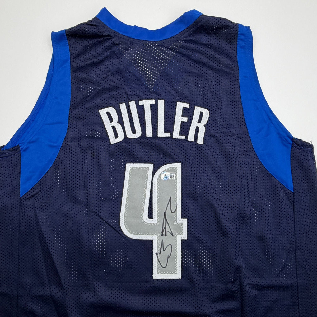 Autographed/Signed Caron Butler Dallas Blue Basketball Jersey Beckett BAS COA