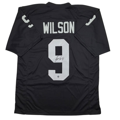 Autographed/Signed Tyree Wilson Oakland Las Vegas Black Football Jersey Beckett BAS COA