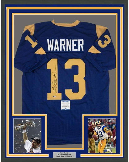 Framed Autographed/Signed Kurt Warner 35x39 St. Louis Blue Football Jersey JSA COA