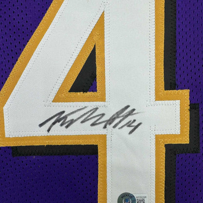 Framed Autographed/Signed Kyle Hamilton 35x39 Baltimore Purple Football Jersey Beckett BAS COA