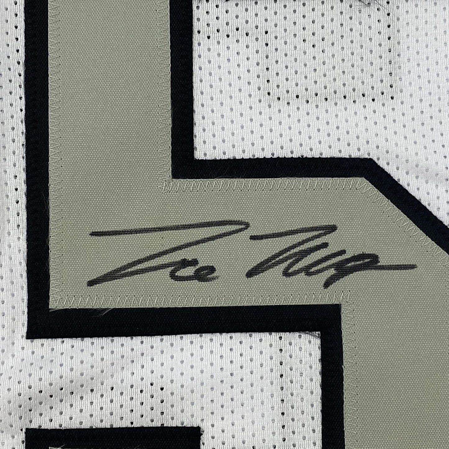 Framed Autographed/Signed Trevon Moehrig 35x39 Las Vegas Oakland White Color Rush Football Jersey JSA COA