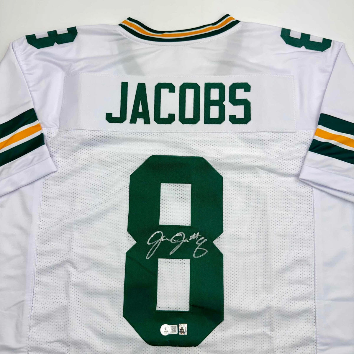 Autographed/Signed Josh Jacobs Green Bay White Football Jersey Beckett BAS COA