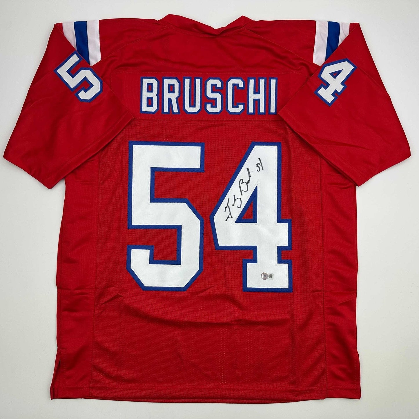 Autographed/Signed Tedy Bruschi New England Red Football Jersey Beckett BAS COA