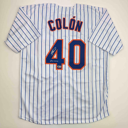 Autographed/Signed Bartolo Colon Inscribed Big Sexy New York Pinstripe Baseball Jersey Beckett BAS COA