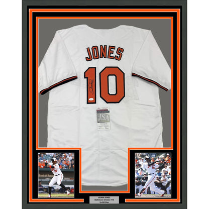 Framed Autographed/Signed Adam Jones 35x39 Baltimore White Baseball Jersey JSA COA