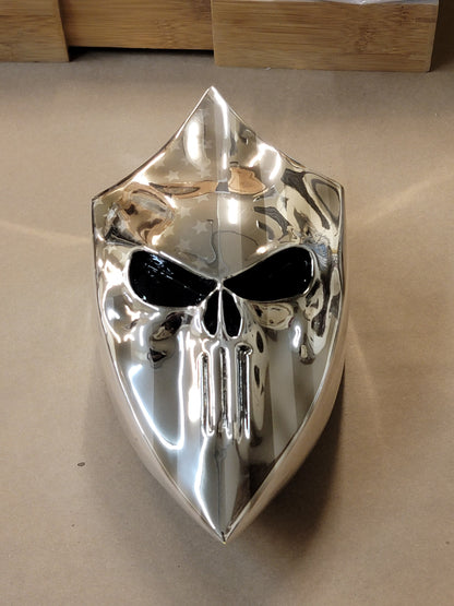 Chrome Harley horn cover with punisher stretching through