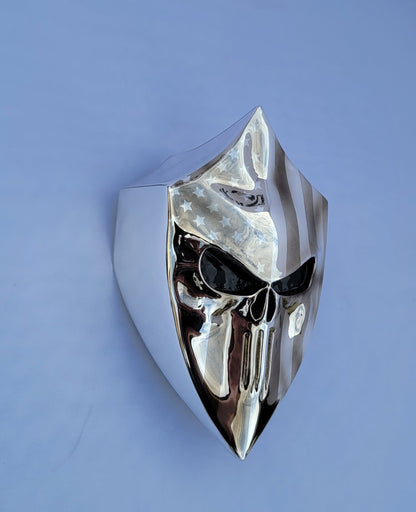 Chrome Harley horn cover with punisher stretching through