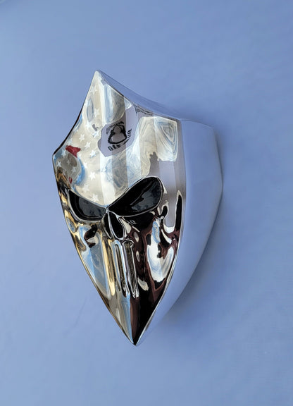 Chrome Harley horn cover with punisher stretching through