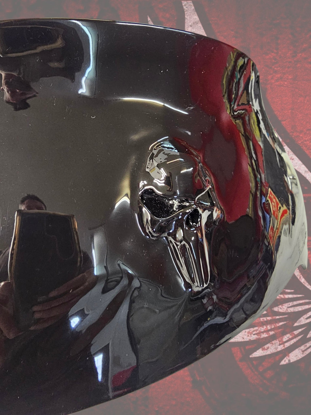 Punisher skull stretching through windshield