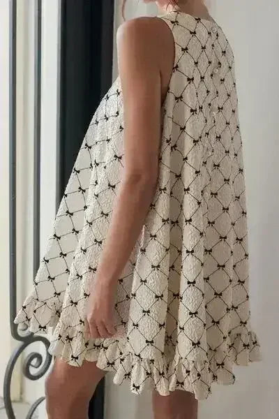 Ruffled Hem Bow Print Sleeveless Mini Dress
