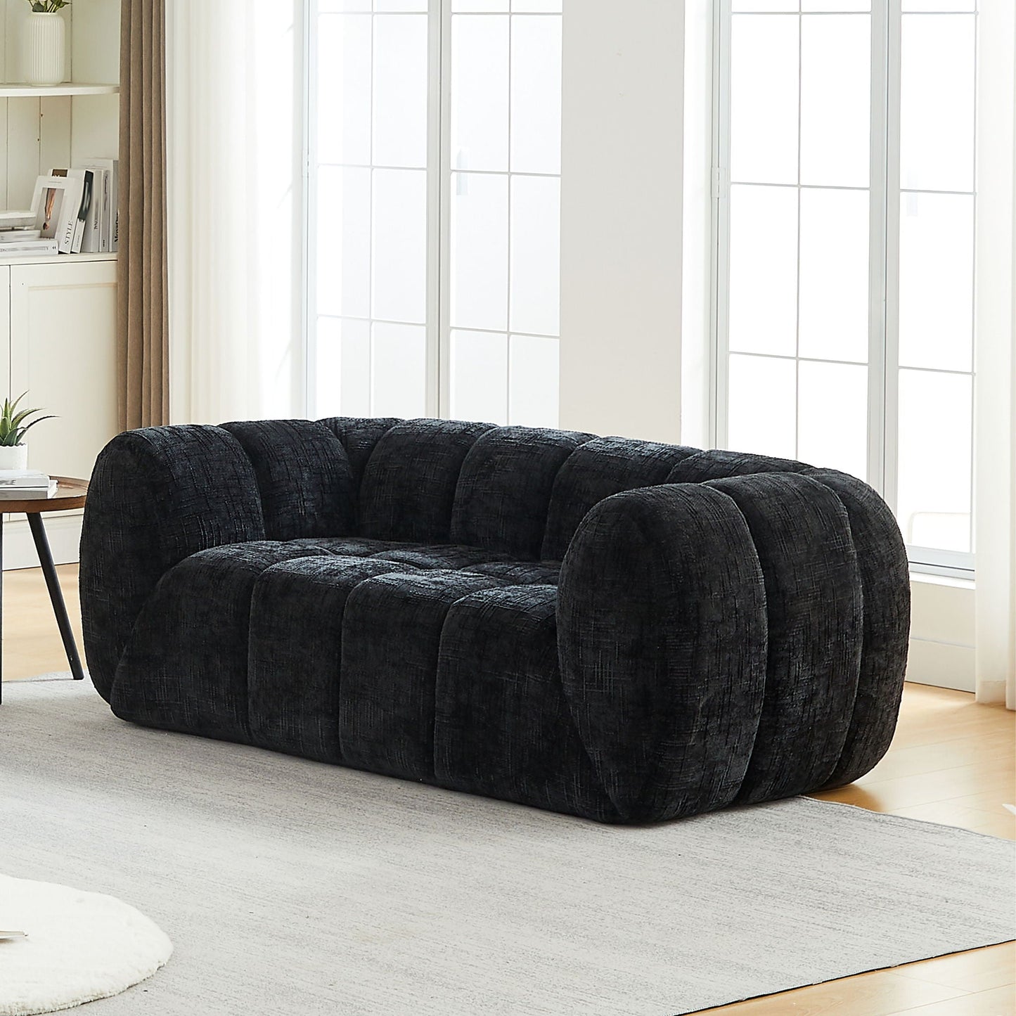 Quilted Cloud Sofa With Rounded Armrests And Piano Key Backrest Design