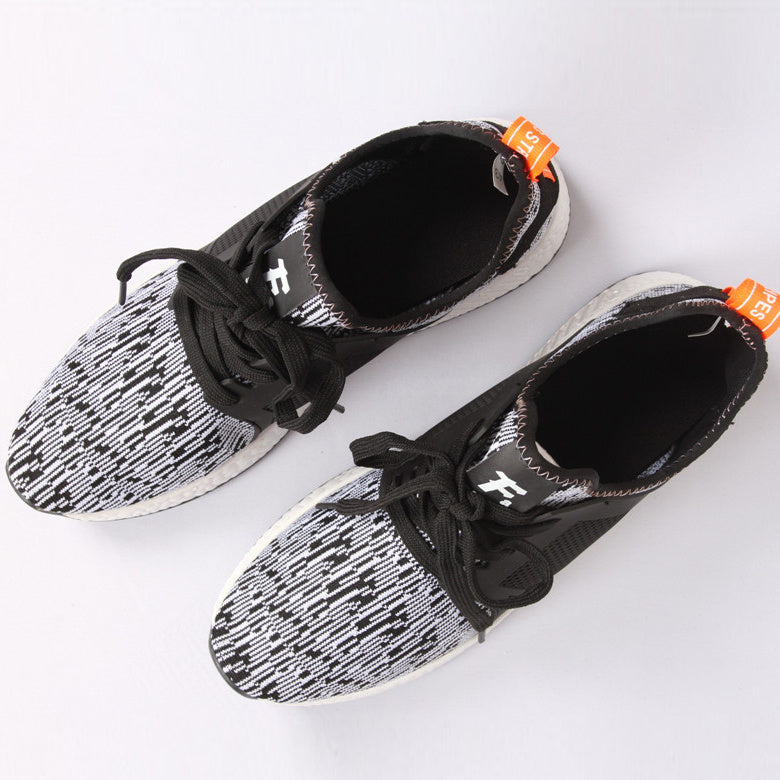 Flying weaving running shoes