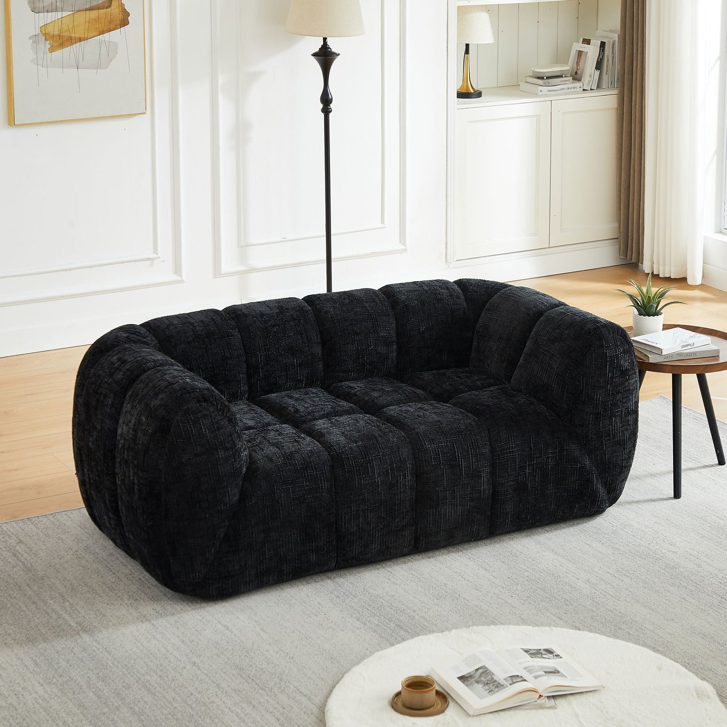 Quilted Cloud Sofa With Rounded Armrests And Piano Key Backrest Design