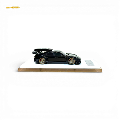 404ERROR Porsche Taycan Black with Roof Box 1:64