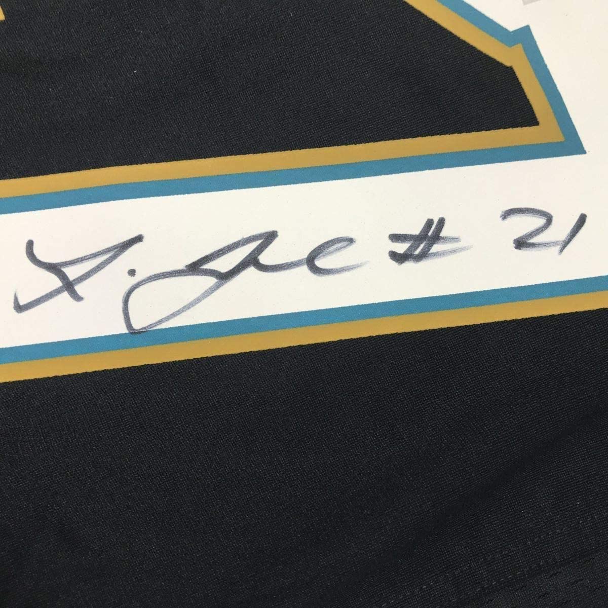 Framed Autographed/Signed Leonard Fournette 35x39 Jacksonville Black Football Jersey Fanatics COA