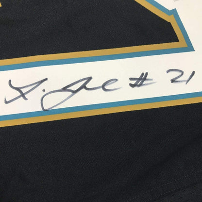Framed Autographed/Signed Leonard Fournette 35x39 Jacksonville Black Football Jersey Fanatics COA