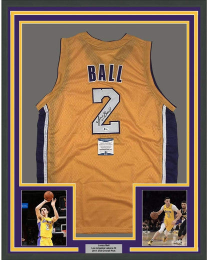 Framed Autographed/Signed Lonzo Ball 35x39 Los Angeles Yellow Basketball Jersey Beckett BAS COA