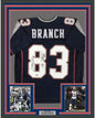 Framed Autographed/Signed Deion Branch 35x39 Super Bowl XXXIX MVP New England Blue Football Jersey Tristar COA