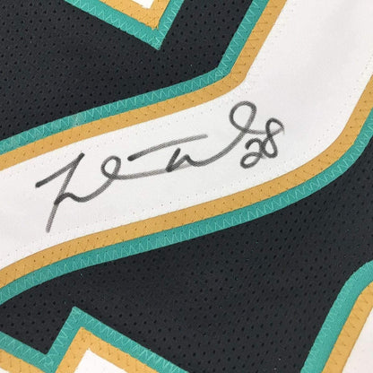 Framed Autographed/Signed Fred Taylor 35x39 Jacksonville Black Football Jersey JSA COA