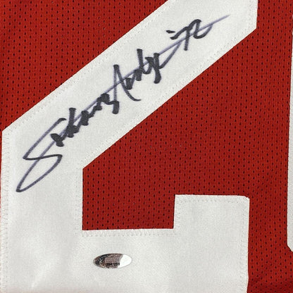 Framed Autographed/Signed Johnny Rodgers 35x39 Nebraska Red College Football Jersey Tristar COA Holo Only