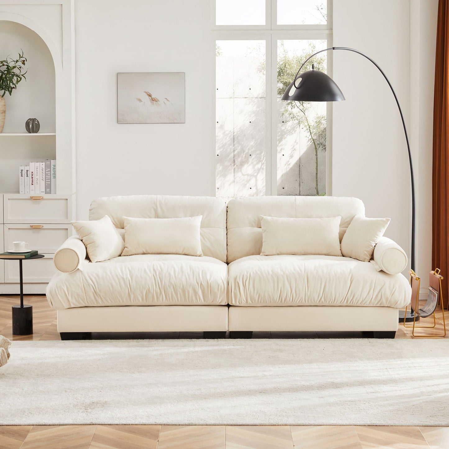 Modern Sofa With Bolstered Armrests And Pillows