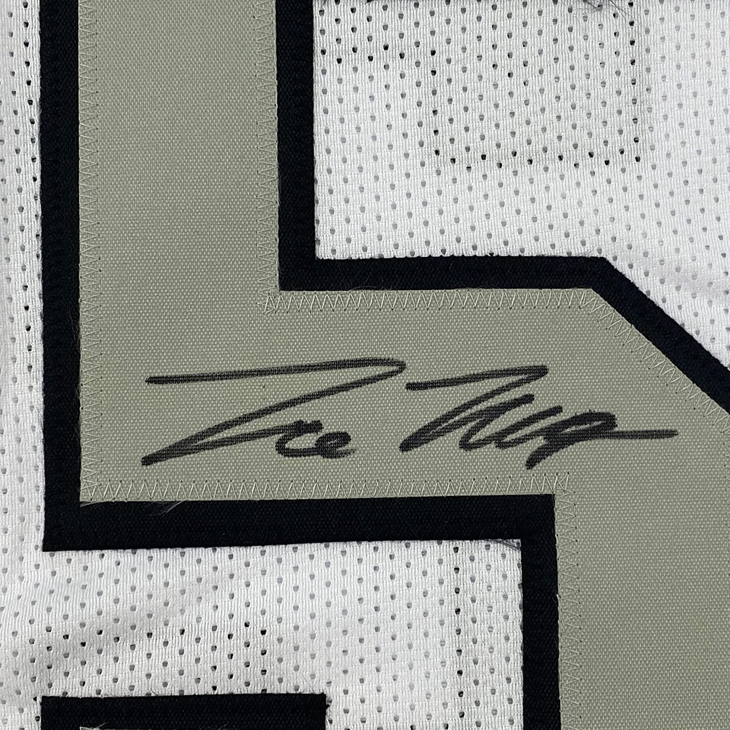 Framed Autographed/Signed Trevon Moehrig 35x39 Las Vegas Oakland White Color Rush Football Jersey JSA COA