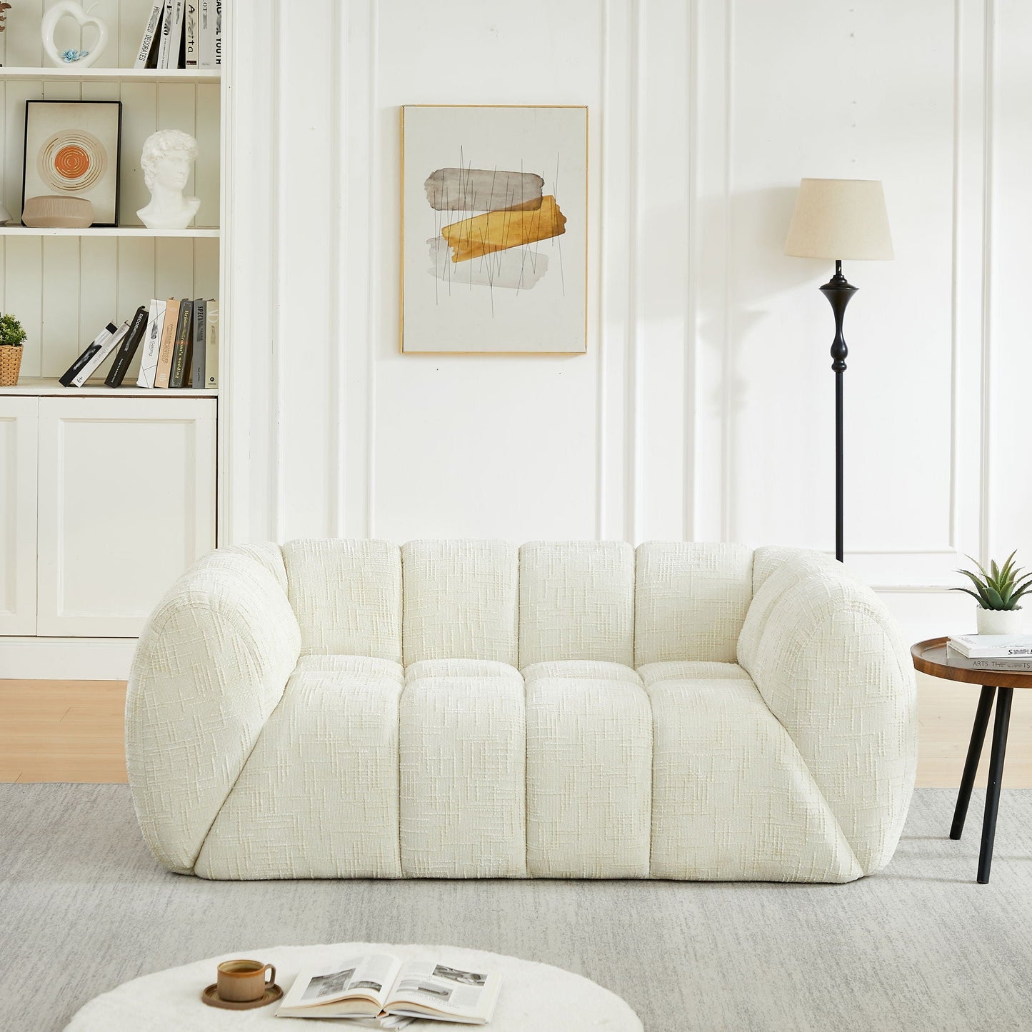 Quilted Cloud Sofa With Rounded Armrests And Piano Key Backrest Design