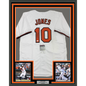 Framed Autographed/Signed Adam Jones 35x39 Baltimore White Baseball Jersey JSA COA