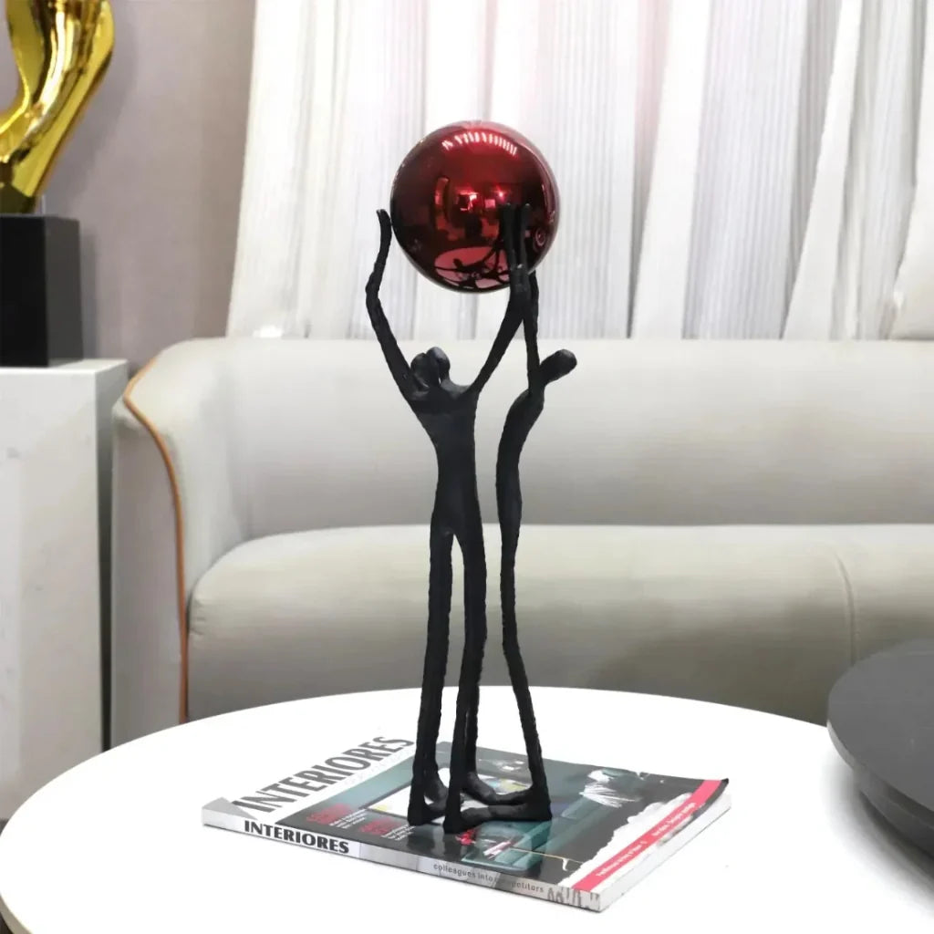 Black Iron Figure Sculpture with Silver Sphere