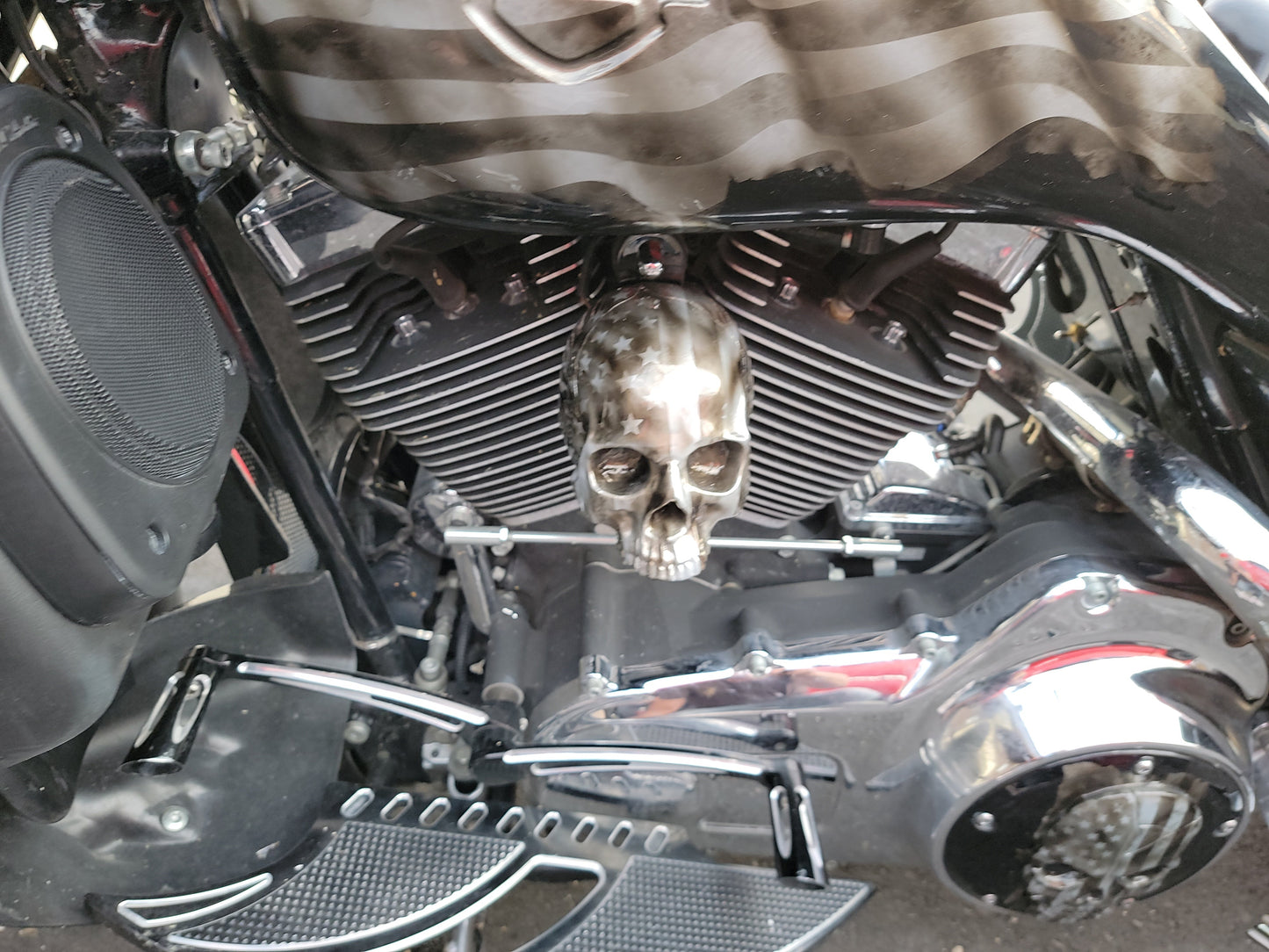 3D ancient skull with tattered American flag