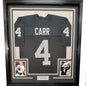 Framed Autographed/Signed Derek Carr 35x39 Las Vegas Oakland Black Football Jersey JSA COA