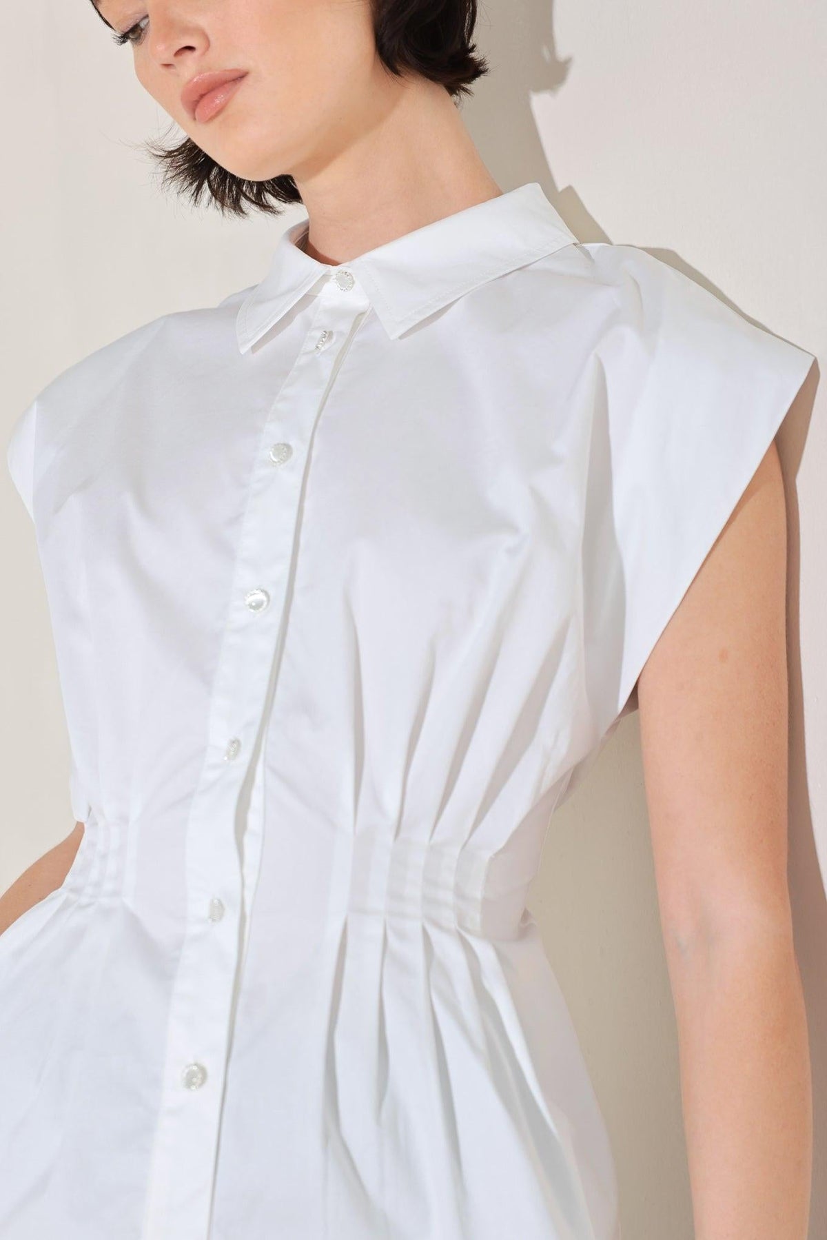 MODERN POISE WOVEN TOP