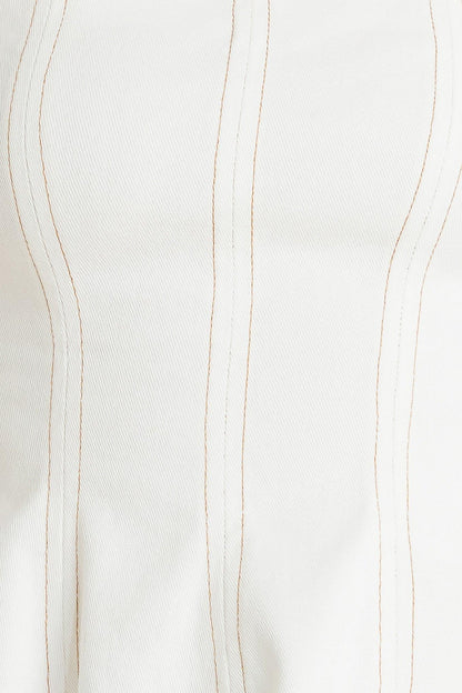 SUBTLE DRAMA WOVEN TOP