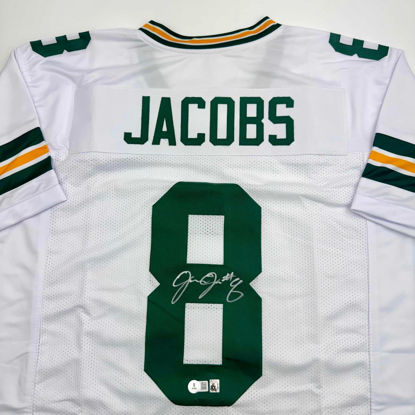 Autographed/Signed Josh Jacobs Green Bay White Football Jersey Beckett BAS COA