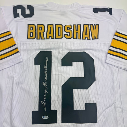 Autographed/Signed Terry Bradshaw Pittsburgh White Football Jersey Beckett BAS COA