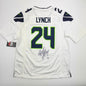 Autographed/Signed Marshawn Lynch Seattle Seahawks White Football Jersey Fanatics COA