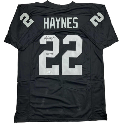 Autographed/Signed Michael Mike Haynes HOF 97 Oakland Black Football Jersey Beckett BAS COA
