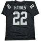 Autographed/Signed Michael Mike Haynes HOF 97 Oakland Black Football Jersey Beckett BAS COA