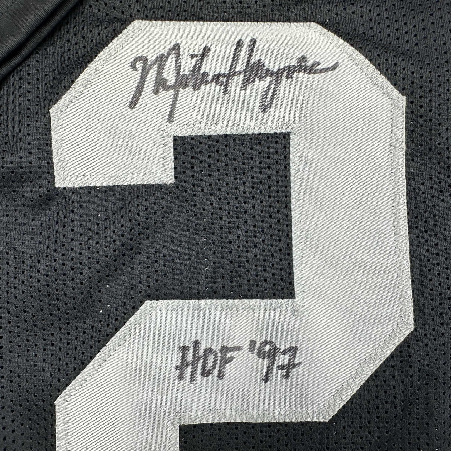 Autographed/Signed Michael Mike Haynes HOF 97 Oakland Black Football Jersey Beckett BAS COA