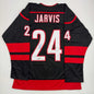 Autographed/Signed Seth Jarvis Carolina Black Hockey Jersey Beckett BAS COA