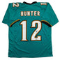 Autographed/Signed Travis Hunter Jacksonville Teal Retro Football Jersey Beckett BAS COA
