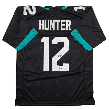 Autographed/Signed Travis Hunter Jacksonville Black Football Jersey Beckett BAS COA